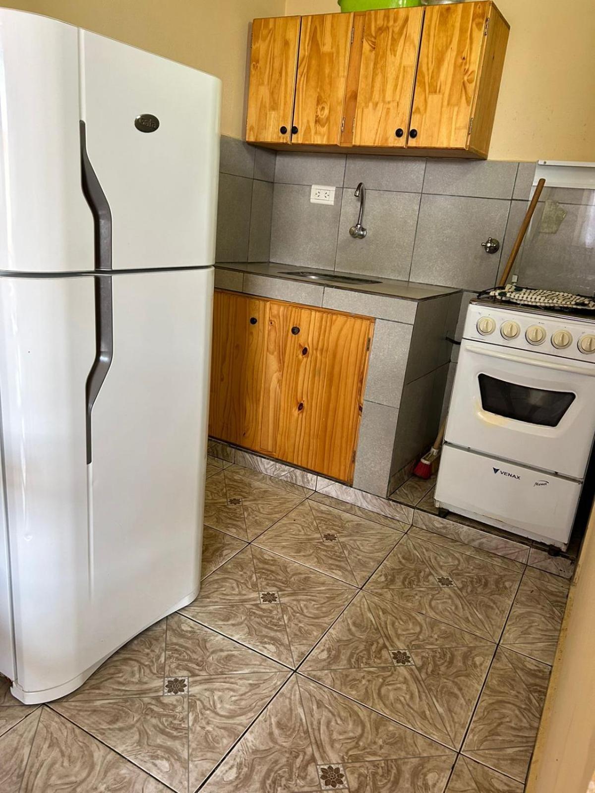 Apart Clemencia Apartment ปูแอร์โตอีกวาซู ห้อง รูปภาพ
